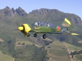 A2A_033 - near Stellenbosch - a YAK 52 with the mountains in the background