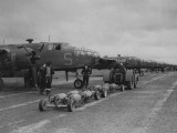 320__0008 - Ground crews arm B-25's before a raid into occupied France